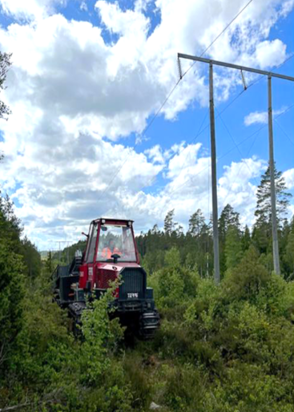 Bandburenmaskin i fält 